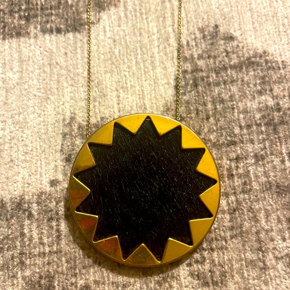 Exclusive pony hair gold sunburst necklace